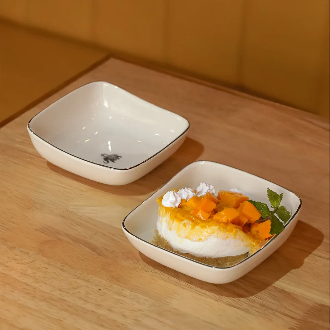 Gaj Fine Porcelain Curved Square Bowl Set of 4 – Platinum Rim with Elephant Motif - Vola Global