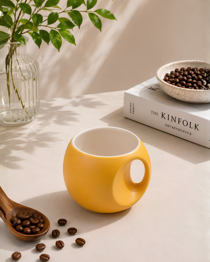 Blazing Mango Orb Mug - round fine porcelain coffee mug with comfort grip handle