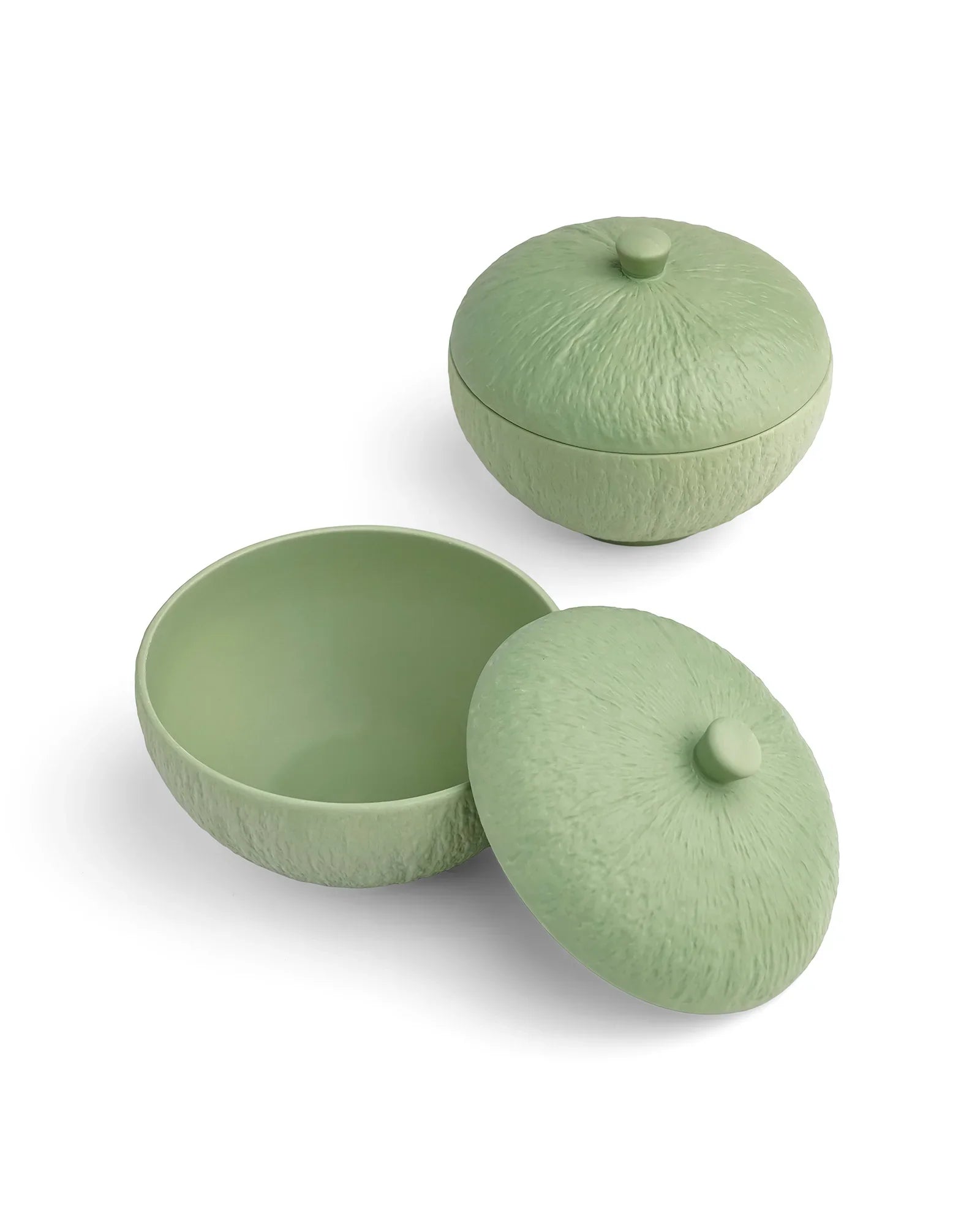 Premium light green textured porcelain bowl with matching lid from Vola Global