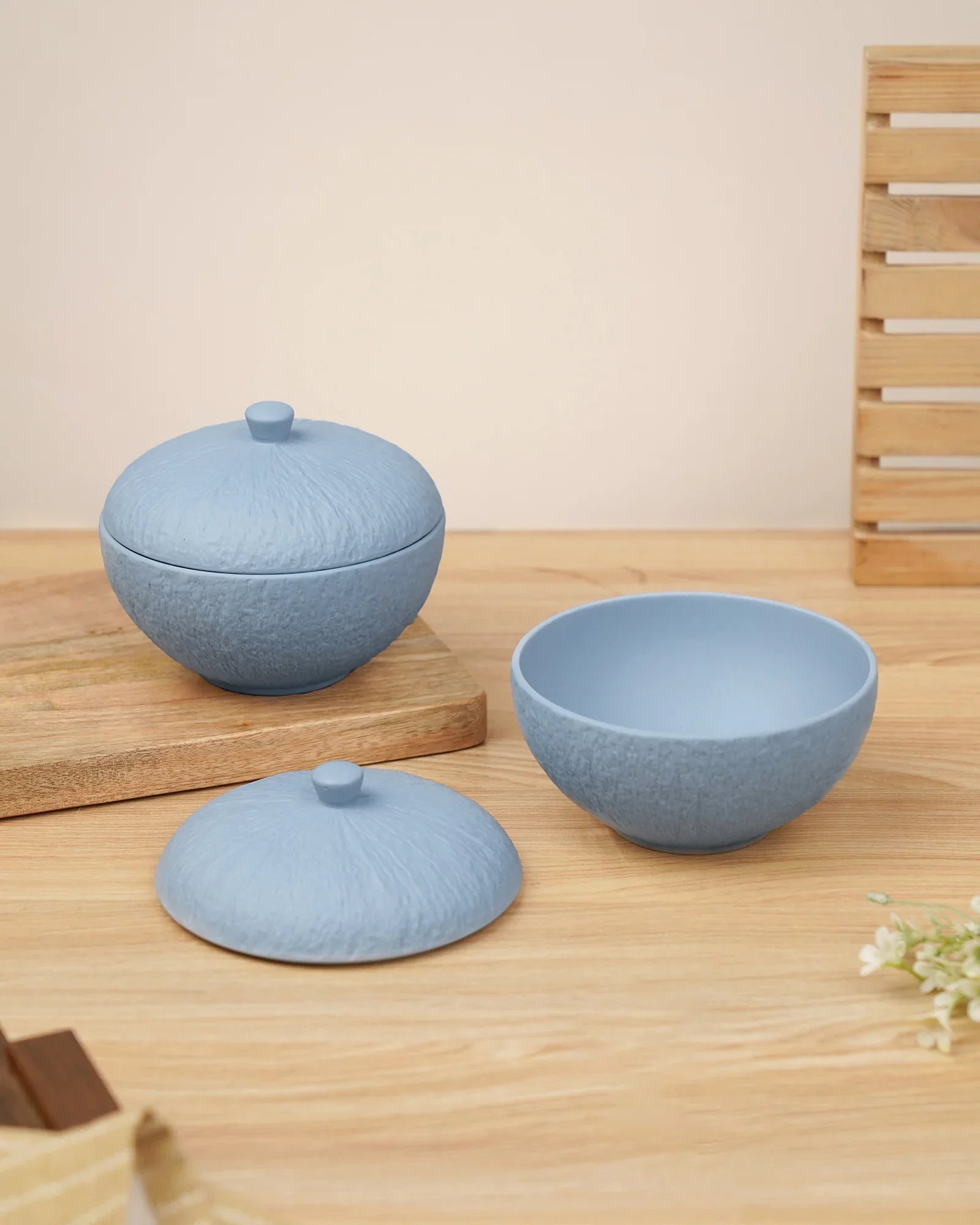 Premium blue porcelain bowls with lids on wooden table, Vola Global crockery collection
