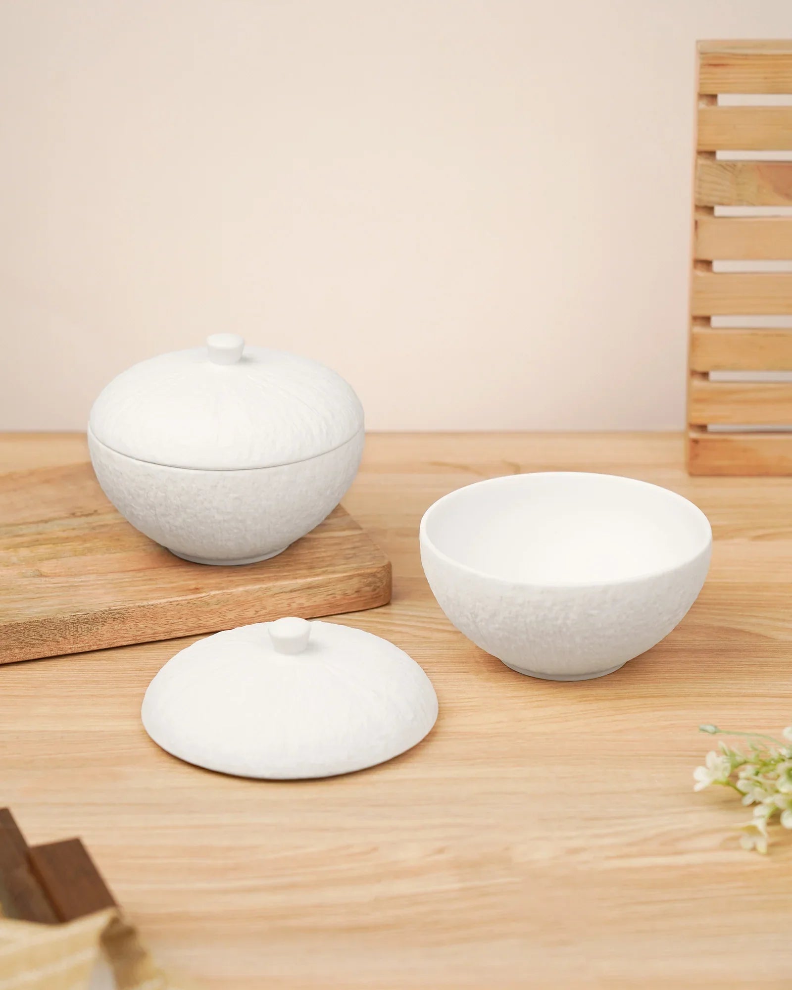 Premium white porcelain bowls with lids on wooden table, Vola Global crockery collection