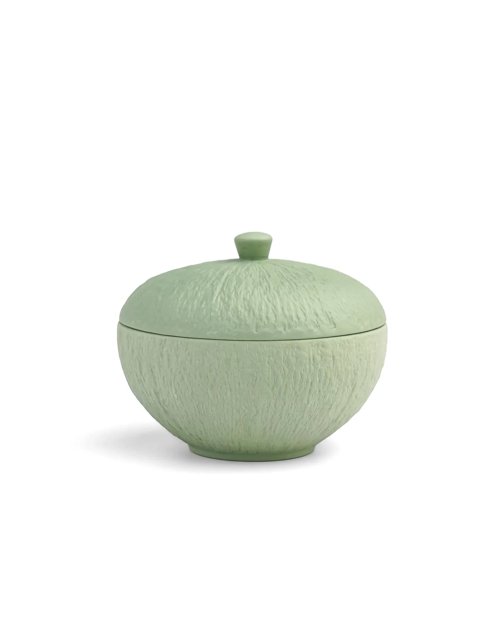 Textured green porcelain bowl with lid from Vola Global on white background