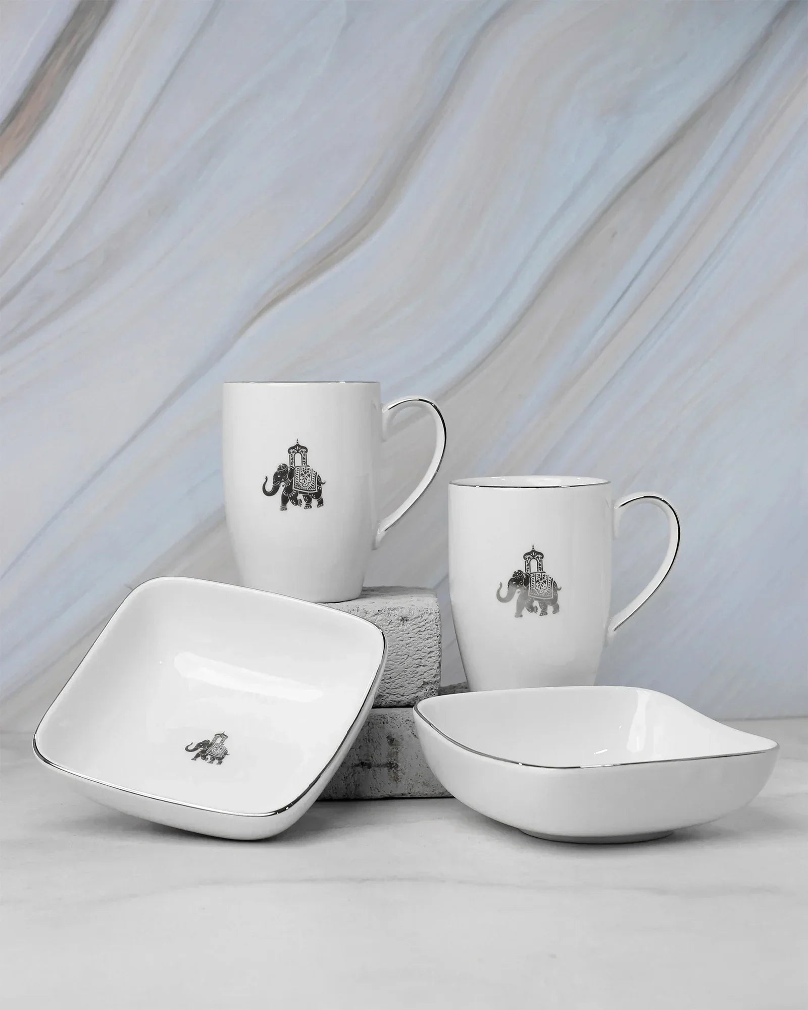 Gaj Mug &amp; Bowl Set – 2 Fine Porcelain Mugs + 2 Curved Square Bowls with Elephant Motif - Vola Global