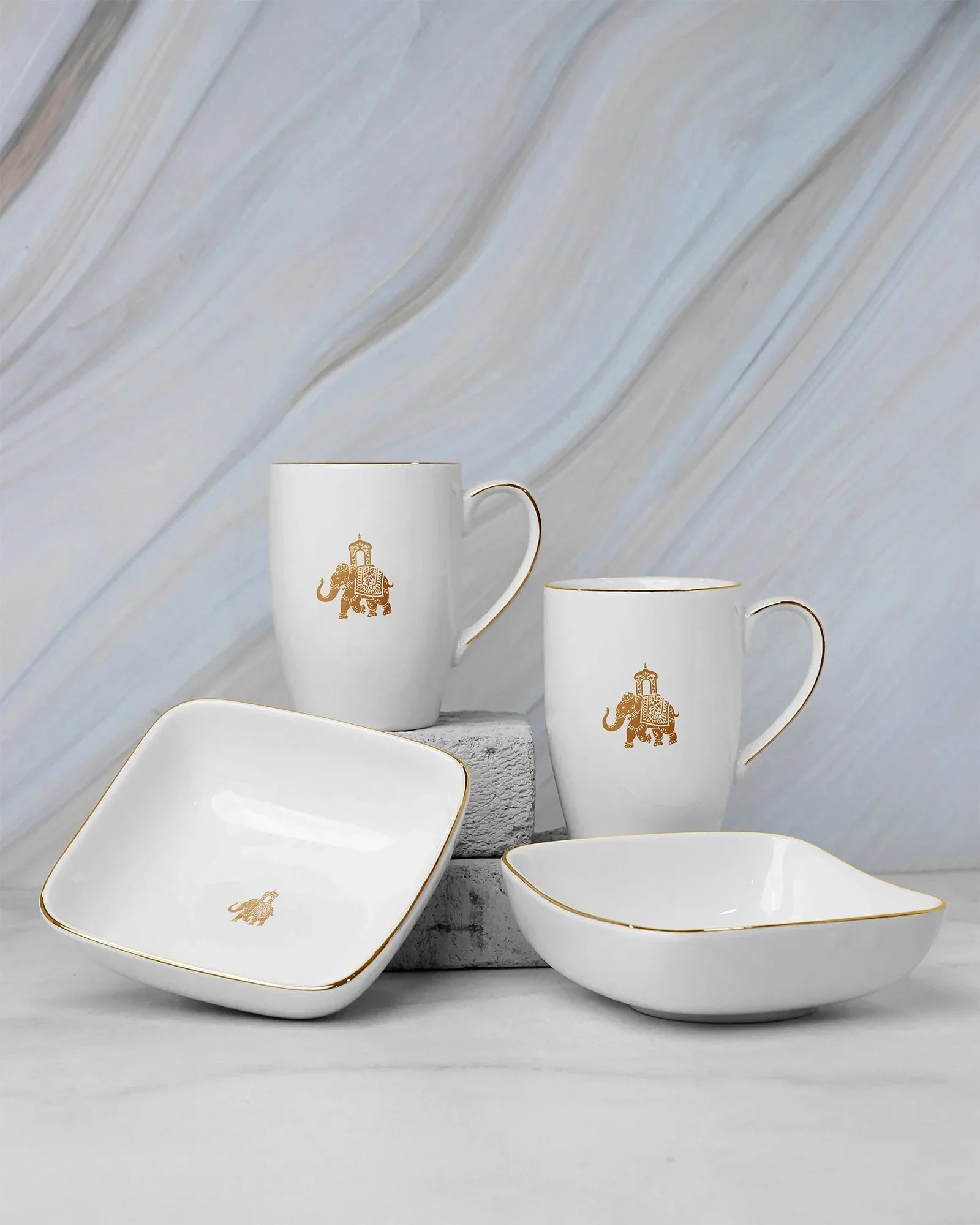 Gaj Mug &amp; Bowl Set – 2 Fine Porcelain Mugs + 2 Curved Square Bowls with Elephant Motif - Vola Global
