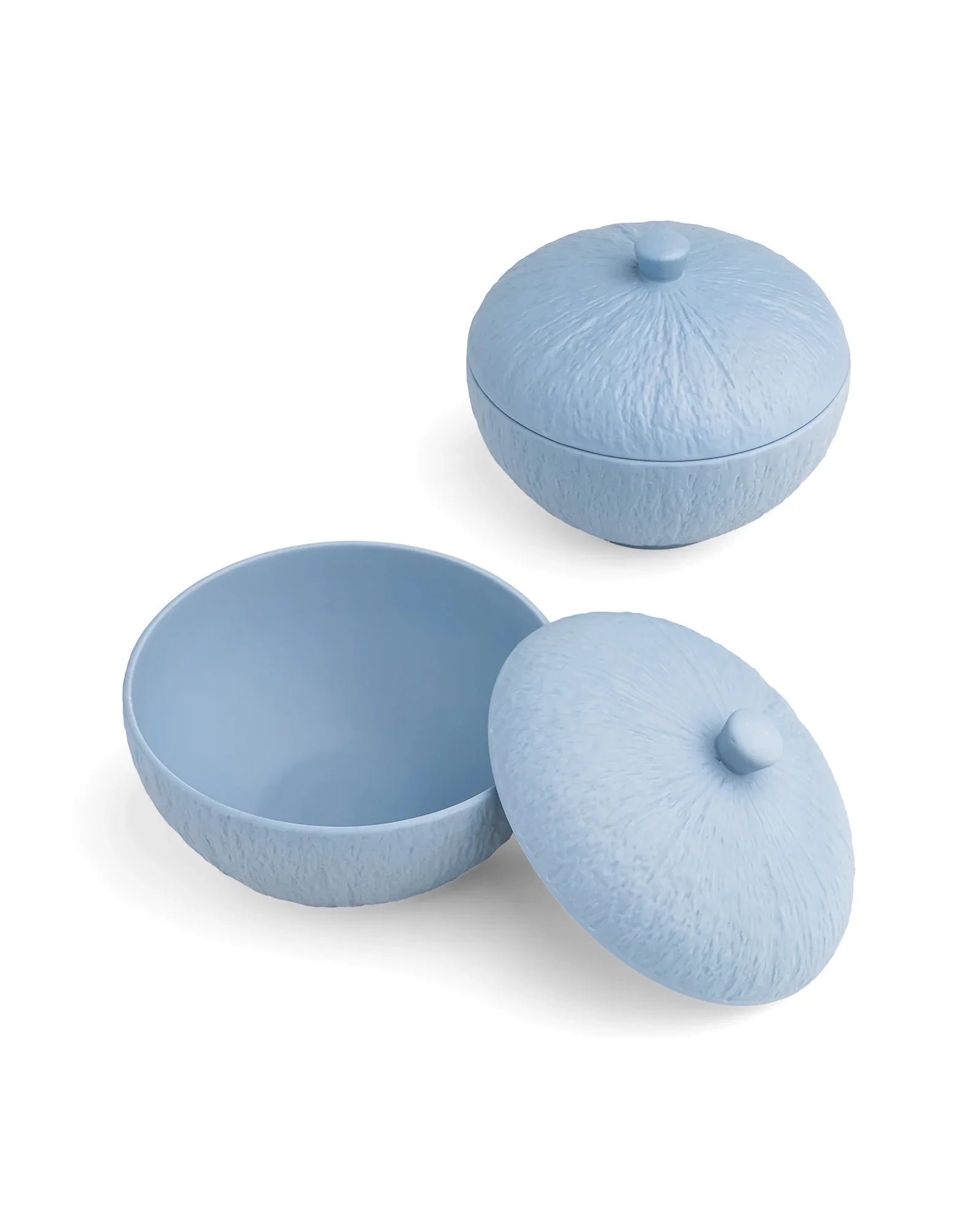 Premium blue porcelain bowl with textured surface and lid by Vola Global