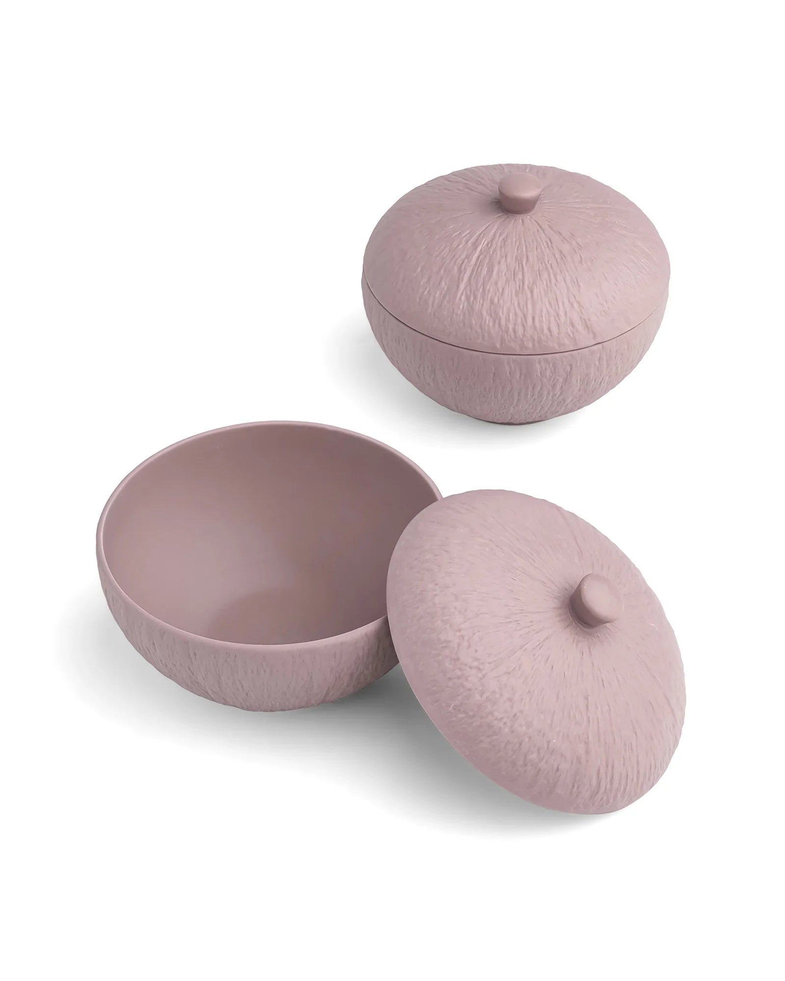 Textured pink porcelain bowls with lids by Vola Global, premium crockery on white background